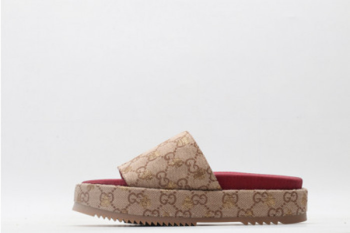 G*u*i slippers