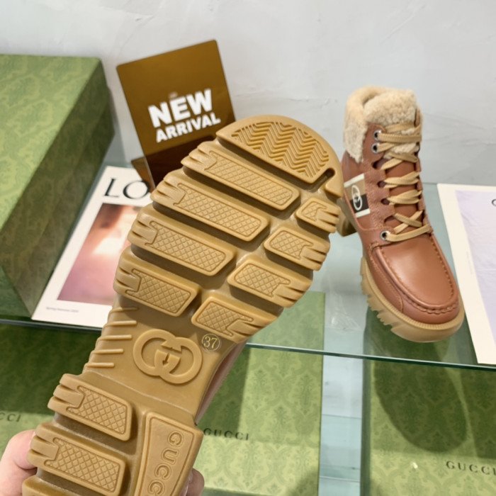 G*u*i boots