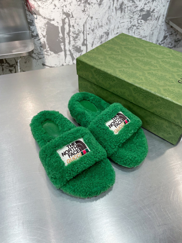 G*u*i slippers