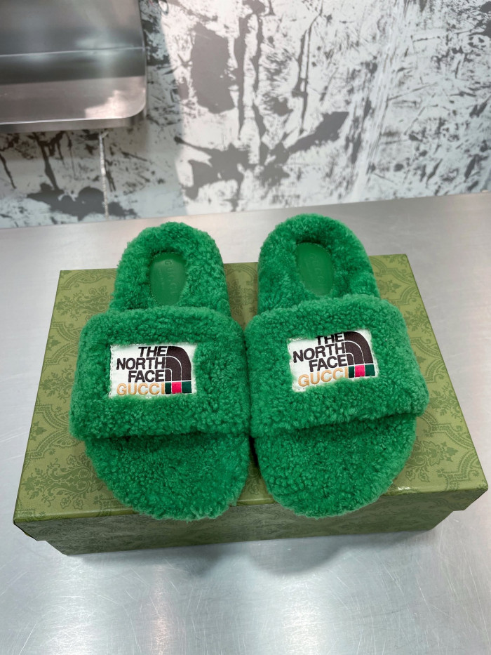G*u*i slippers