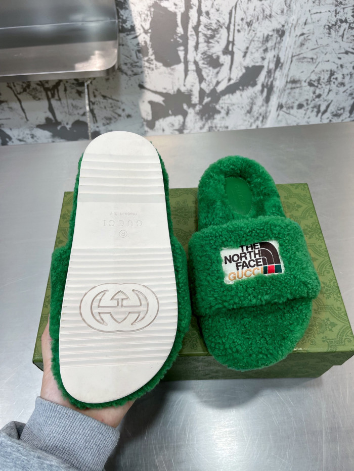 G*u*i slippers