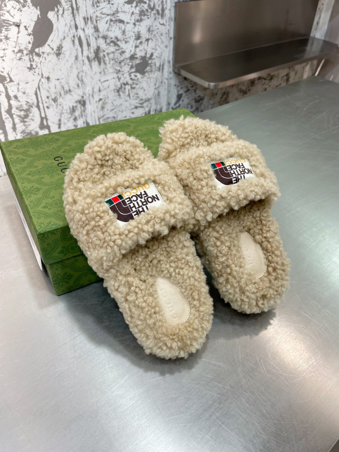 G*u*i slippers