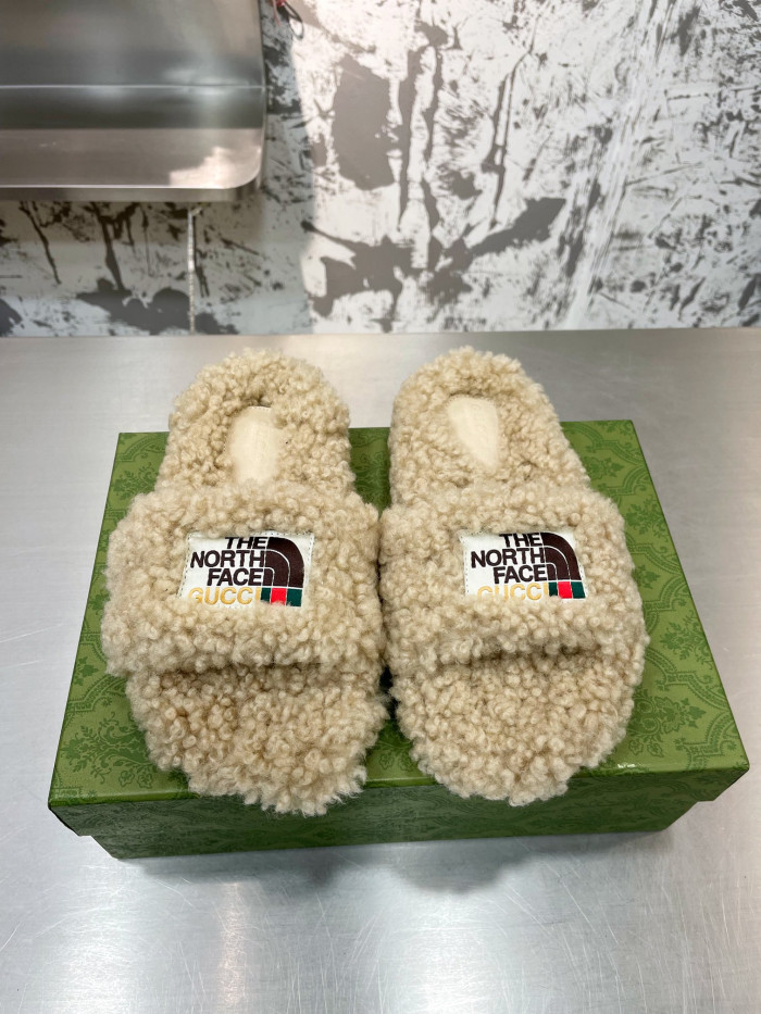 G*u*i slippers