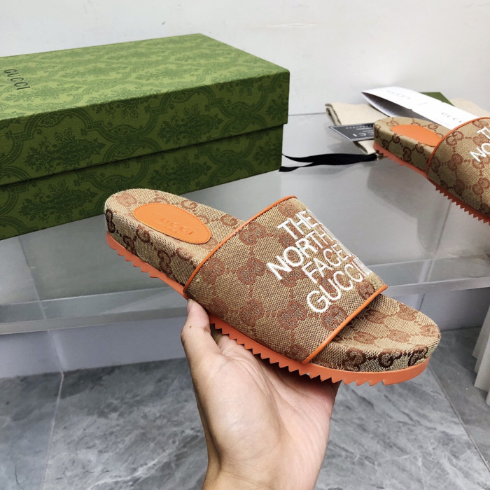 G*u*i slippers