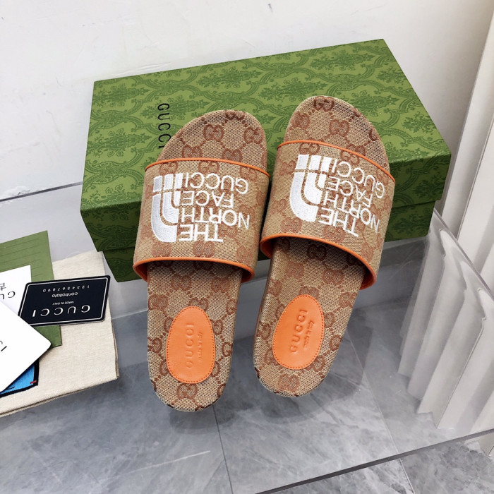 G*u*i slippers