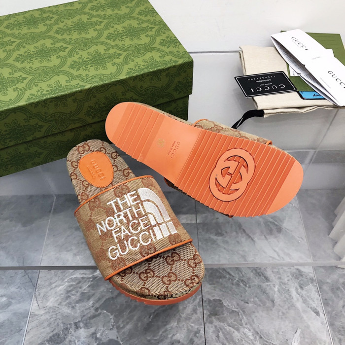 G*u*i slippers