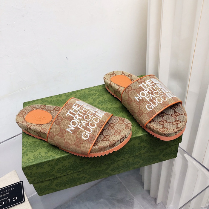 G*u*i slippers